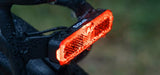 Feu arrière E-Bike Sigma EOX RL avec frein à porte-bagages